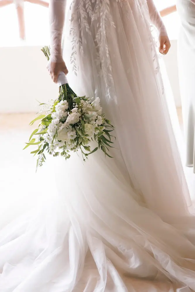 Bride with bouquet in Puerto Vallarta by Evgenia Kostiaeva